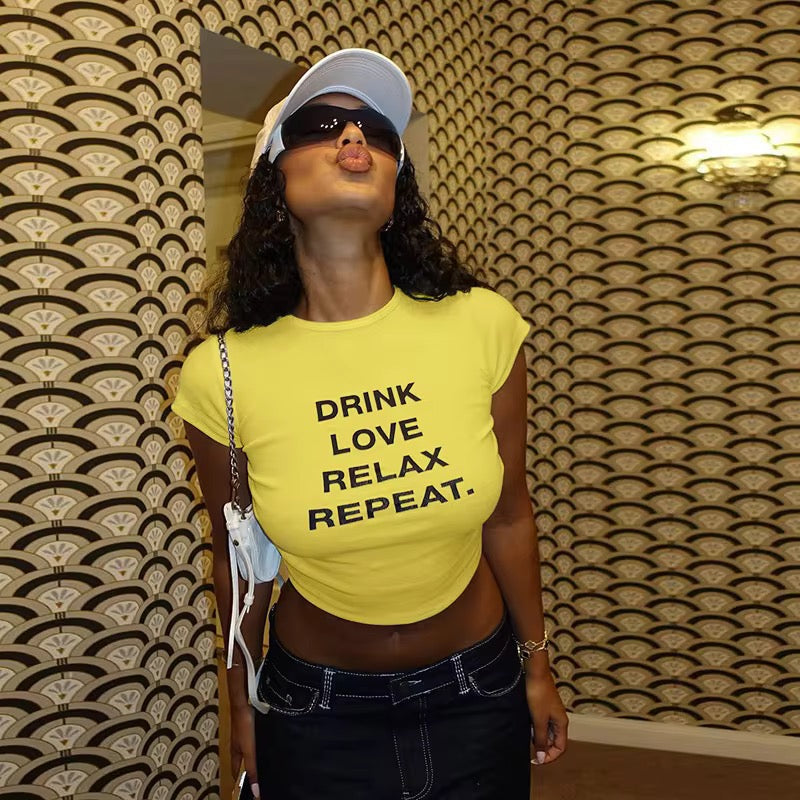 Drink Love Relax Repeat Yellow Crop Top